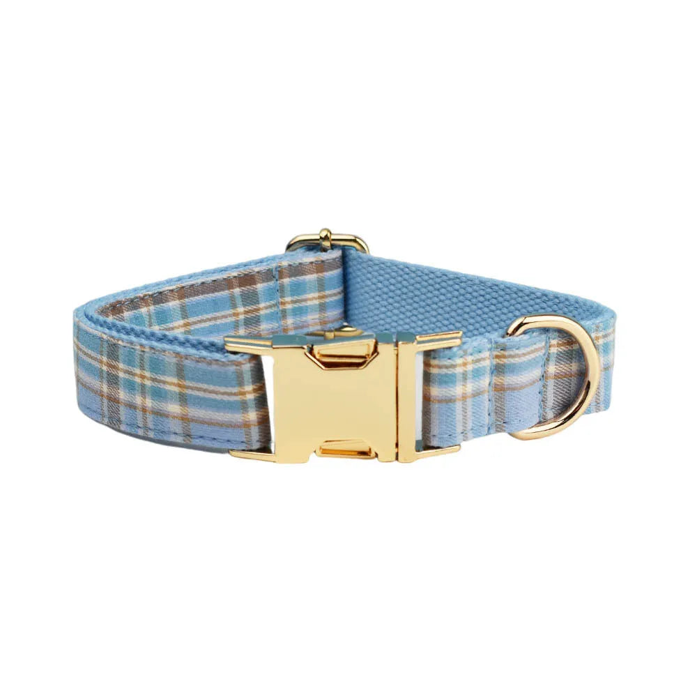 Sky blue grid pattern dog collar and leash set with matching bow and vest accessories