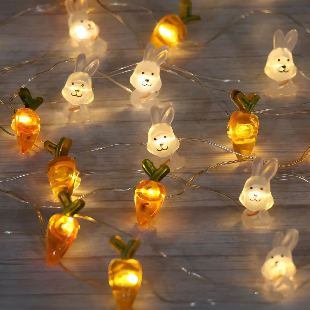 Easter LED bunny string lights with carrot and white rabbit bulbs on a dark background
