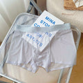 Men's thin breathable nylon boxer shorts in light brown colour, showing seamless mid waist design.