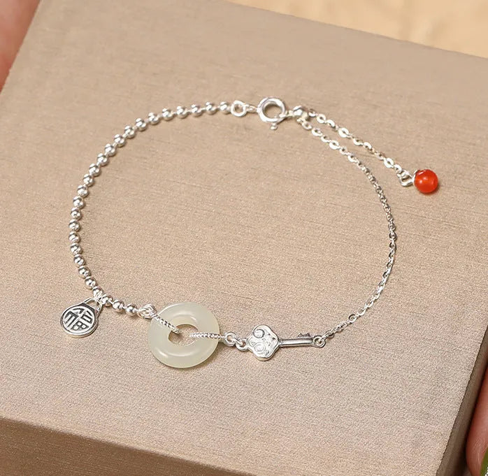 Women's 925 silver Hetian jade bracelet with Chinese style Ruyi Xiaofu geometric design