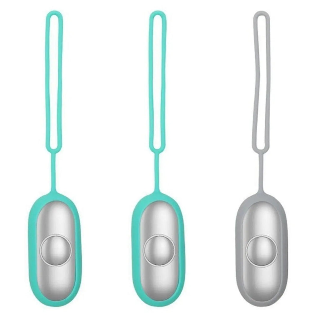 Handheld micro-current sleep aid device in grey colour with USB charging cable