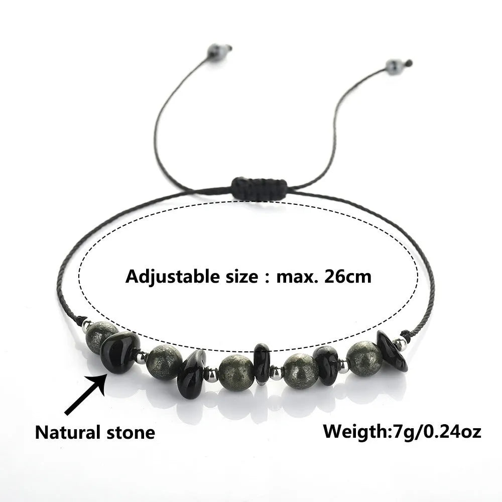 Black garnet geometric stone bracelet with moon charm on wrist