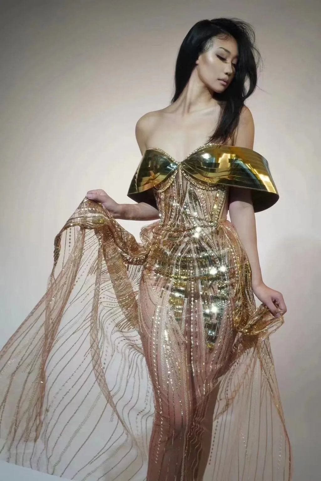 Gold strapless sequin dress with thigh-high split and tulle skirt, floor-length formal gown