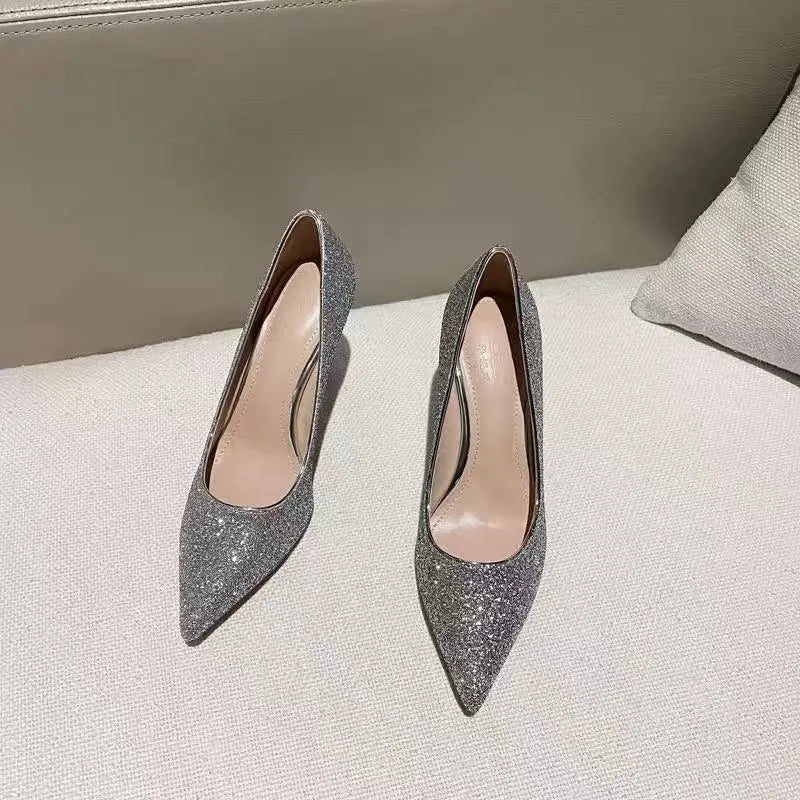 Silver and black women's wedding high heels with crystal detail on PU leather, showing stiletto and block heel options.