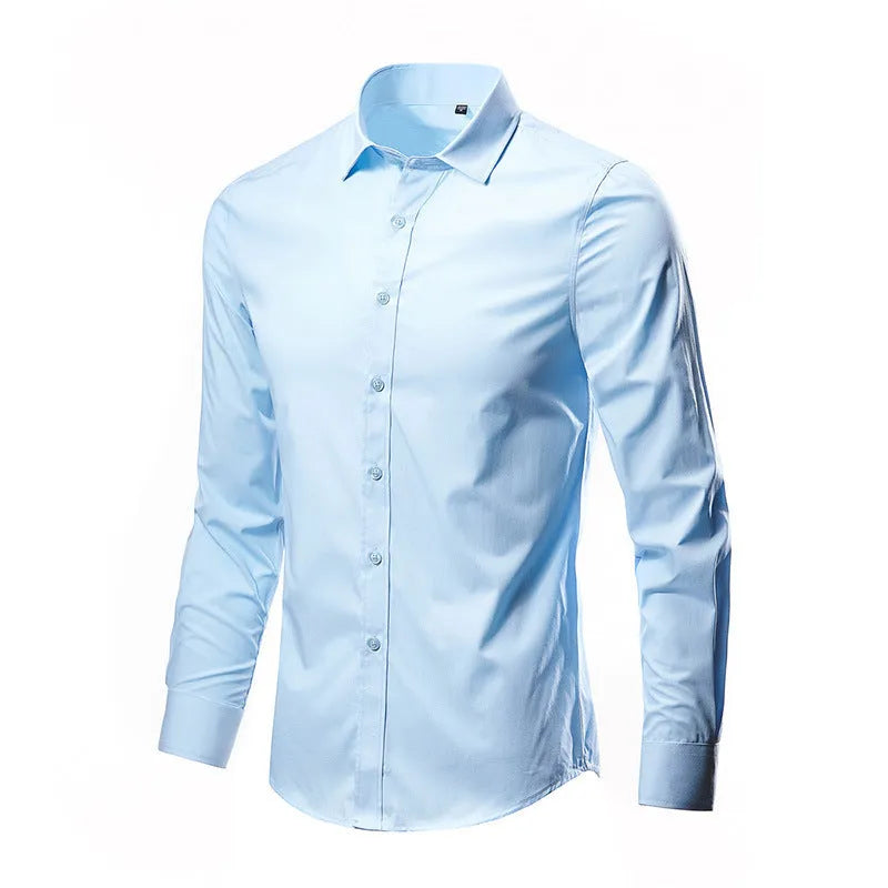 Man wearing a loose-fit linen long-sleeve shirt in a neutral colour, showing the casual style.