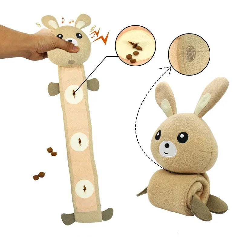 Plush fleece rabbit dog snuffle toy with treat compartments and squeaker, shown on a white background.