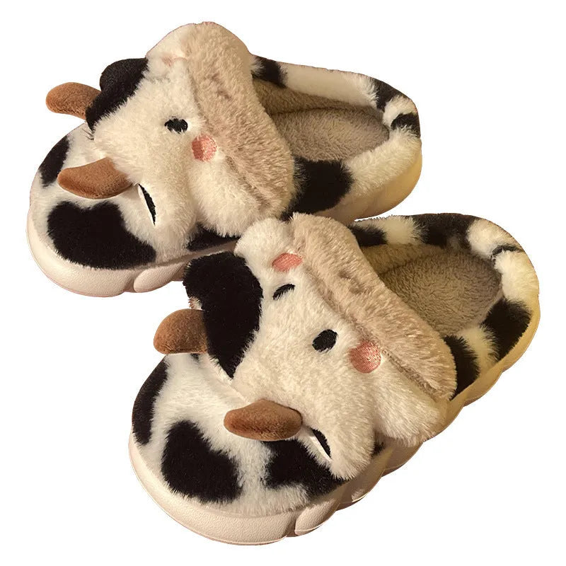 White cow plush slippers with cartoon milk cow pattern and non-slip textured sole