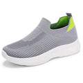 Women's casual running shoes in solid colour with Flyknit upper and round toe.