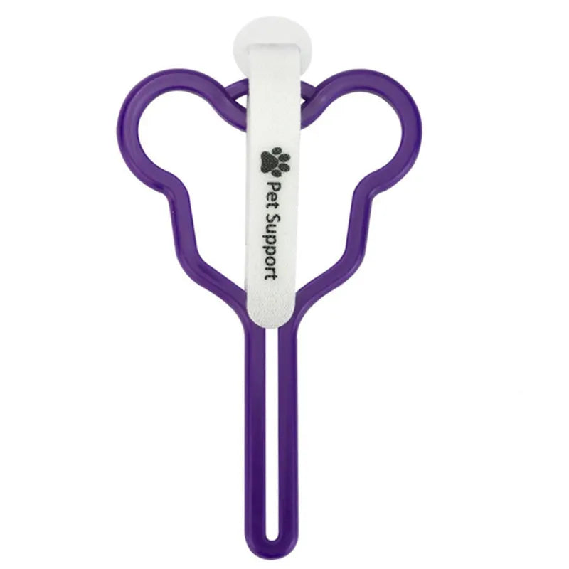 Dog poop bag holder with clip and velcro strap for leash attachment.