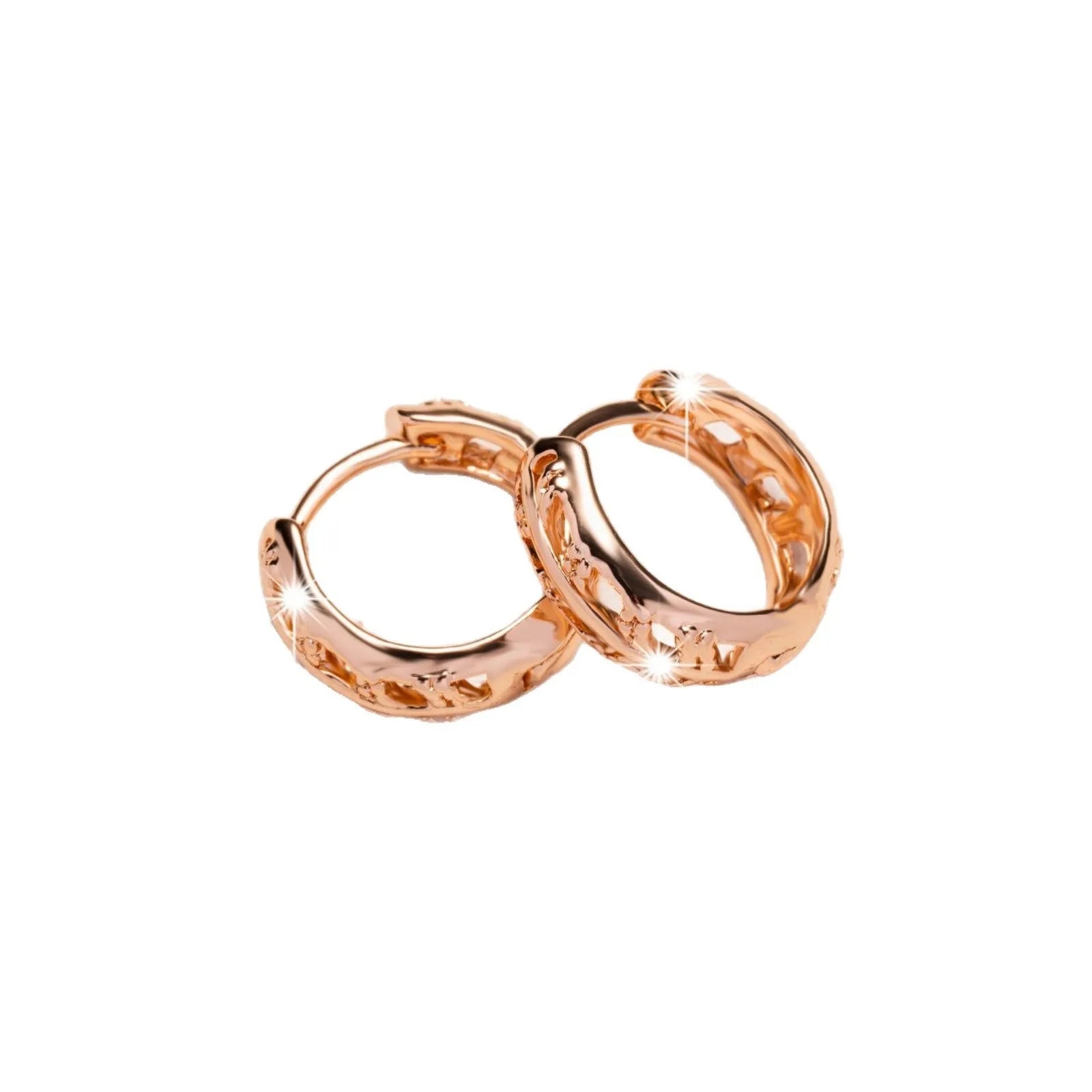 Rose gold plated hollowed-out heart and leaf shaped earrings on a white background.