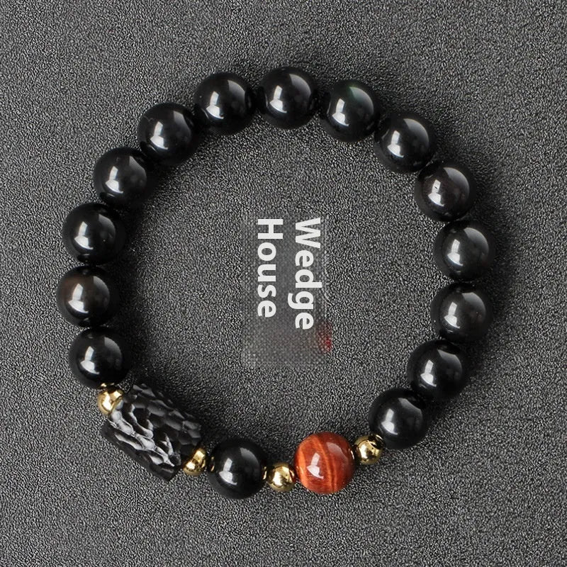 Handmade obsidian bracelet with 10mm yellow tiger eye beads in circular retro design