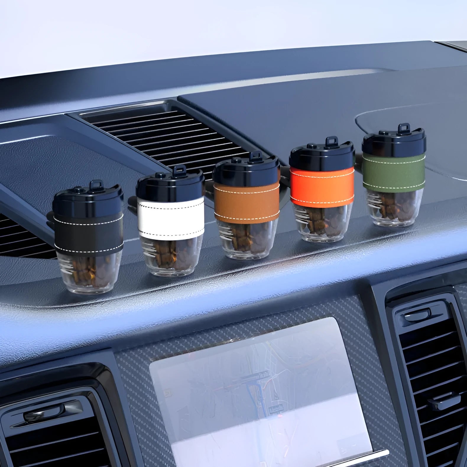 Coffee cup shaped solid car air freshener in black, brown, white, orange, or green.