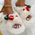 Women's festive slippers with Christmas hat decoration on hairy faux plush upper, shown in black, khaki, or white.