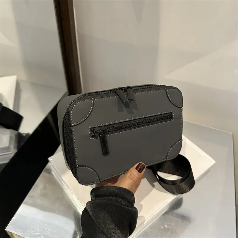 Women's small square crossbody bag in PU leather, horizontal shape, shown in one of five colours with visible sewing lines.