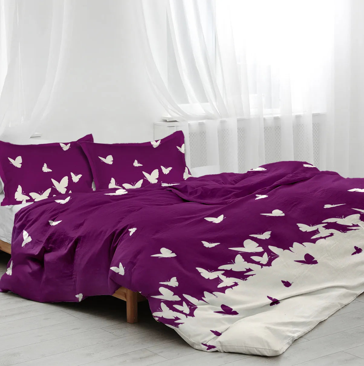 Purple butterfly 3-piece microfiber comforter set with reversible design on a bed