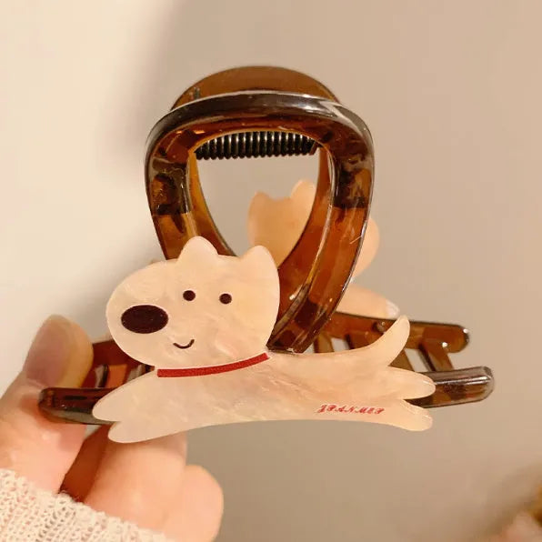 Cartoon puppy design hair barrettes in beige and brown colours with grip mechanism