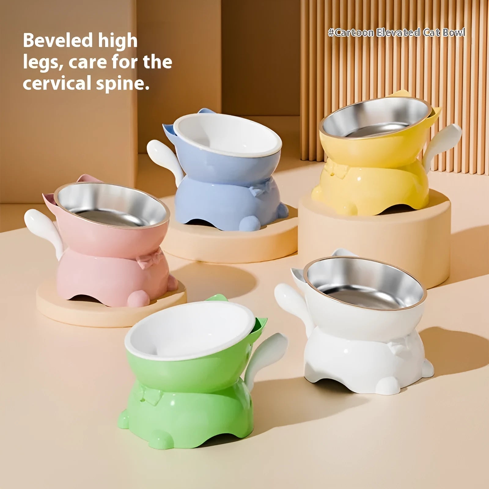 Slanted stainless steel cat bowl in blue with weighted silicone non-slip base on a wooden floor.
