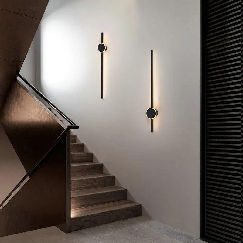 Modern black and white LED strip wall lamp with a grid-free pole gate design and acrylic shade.