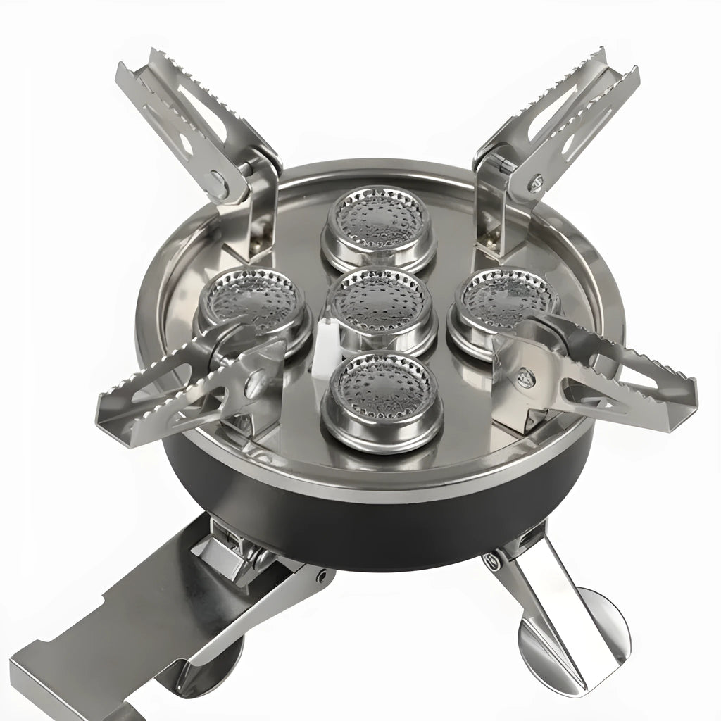 Silver portable split camping stove with fuel hose, shown folded to compact size for transport.
