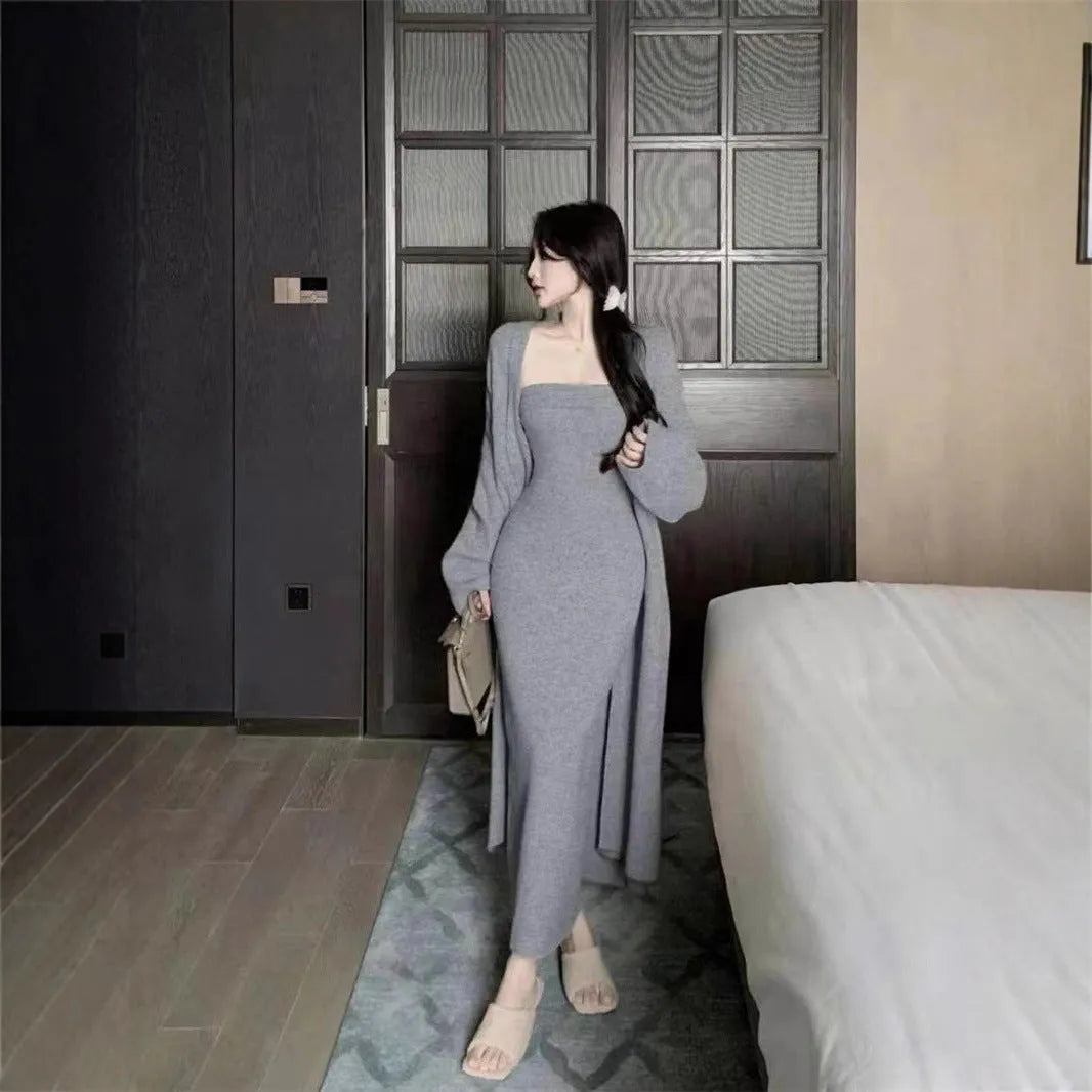 Women's grey flocked knitted long cardigan worn over matching dress in a casual two-piece set.
