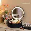 Round Cherry Blossom Pink LED makeup bag with mirror open, showing internal compartments and adjustable lights.