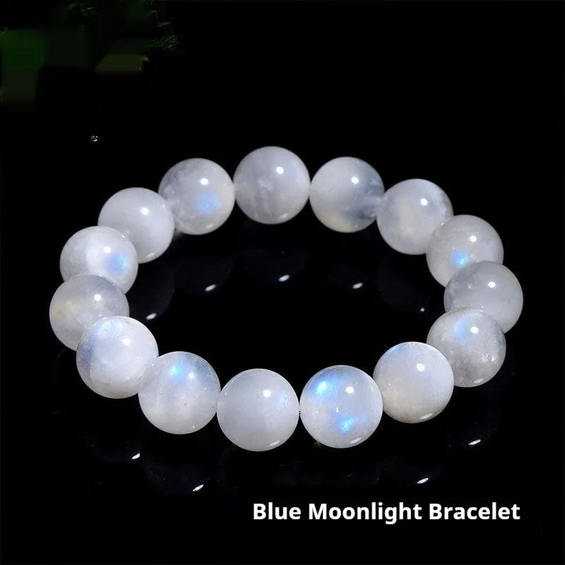 Natural blue moonlight round bead moonstone bracelet on a white background, showing polished geometric beads.