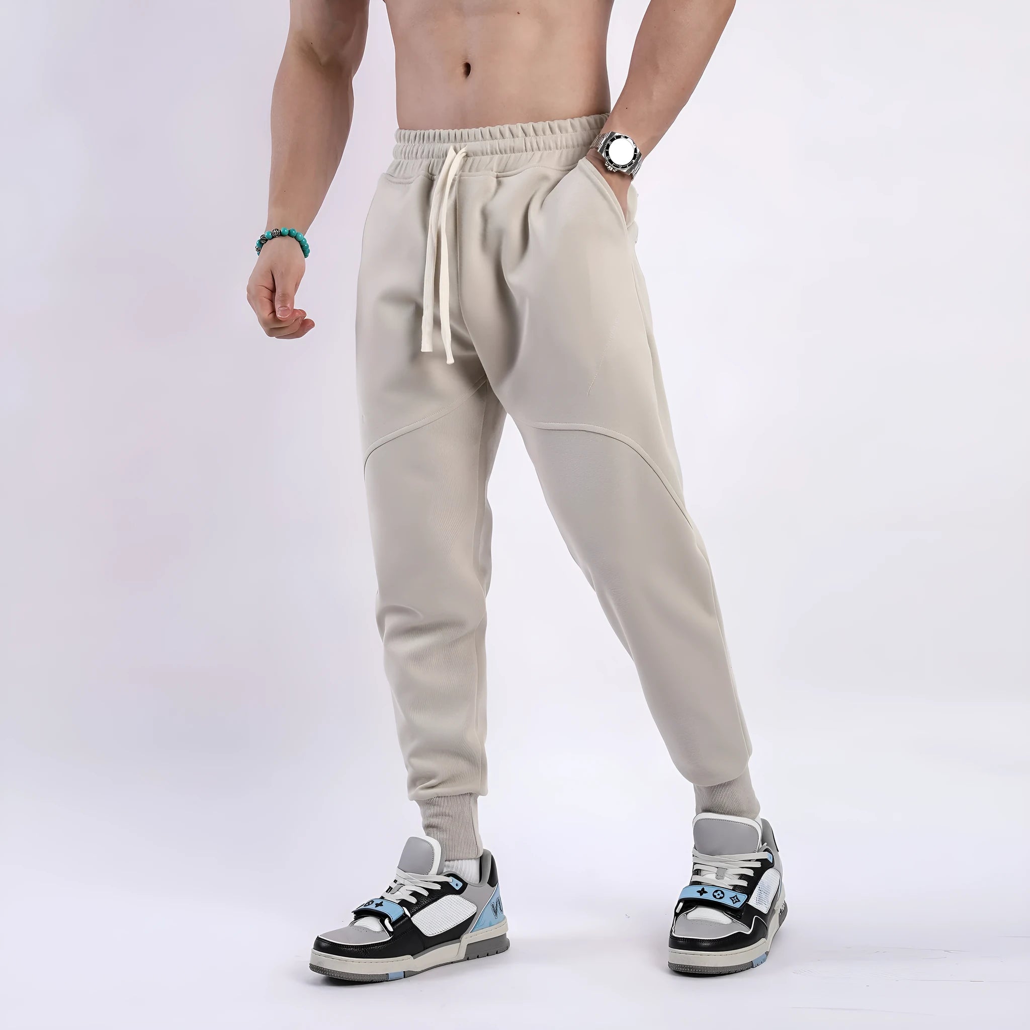 Men's casual trousers with ankle drawstring in polyester cotton fabric available in five colours