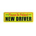 Reflective acrylic car warning bumper sticker for novice drivers measuring 22.5 by 8.5 cm on a car rear bumper.