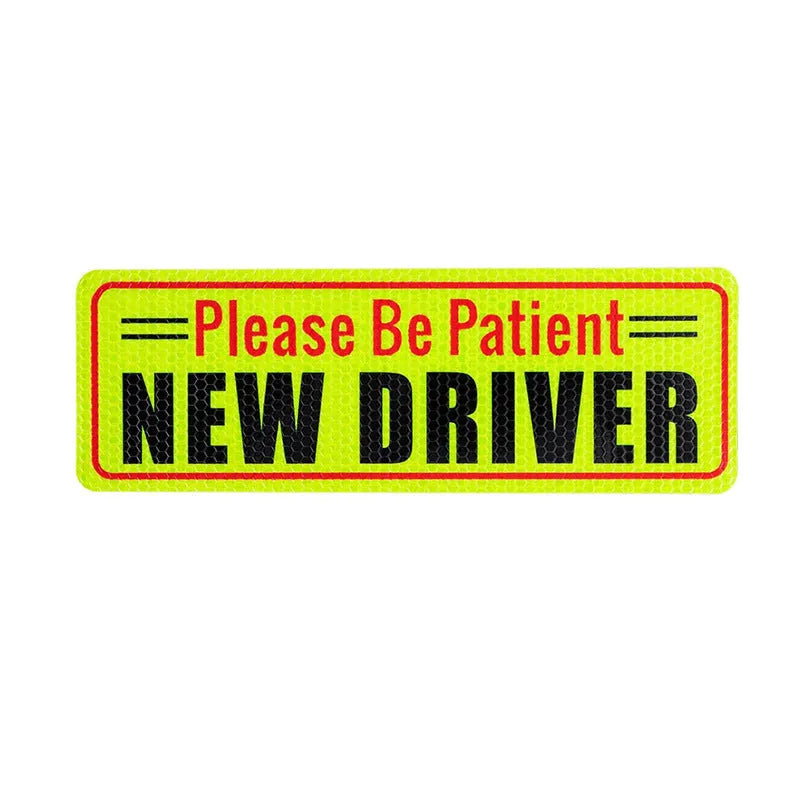 Reflective acrylic car warning bumper sticker for novice drivers measuring 22.5 by 8.5 cm on a car rear bumper.