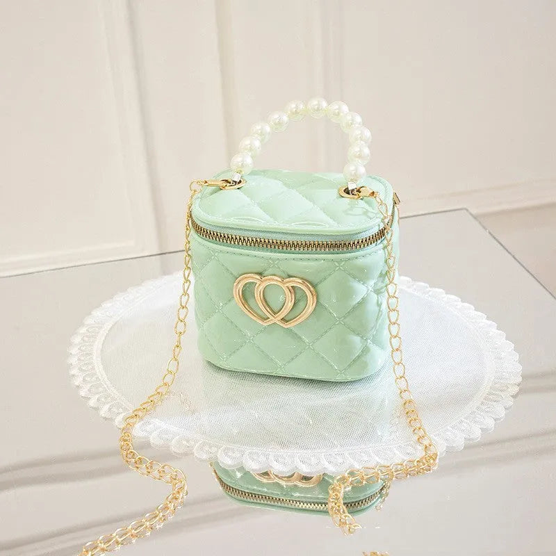 Women's heart-patterned PVC bucket gel bag in apricot colour with bucket shape