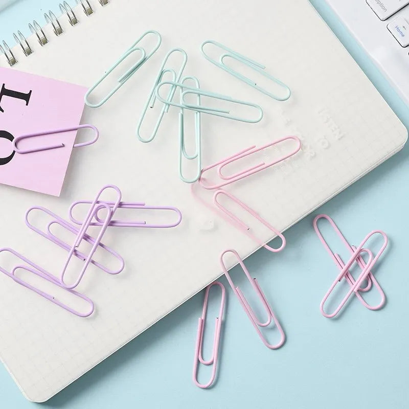 Macaron colour alloy paper clips in pink, purple, and green, large 50mm and small 28mm sizes