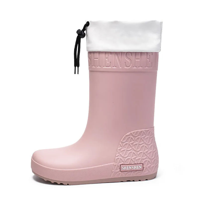 Women's solid colour rain boots with non-slip soles in apricot, black, brown, and pink waterproof finishes