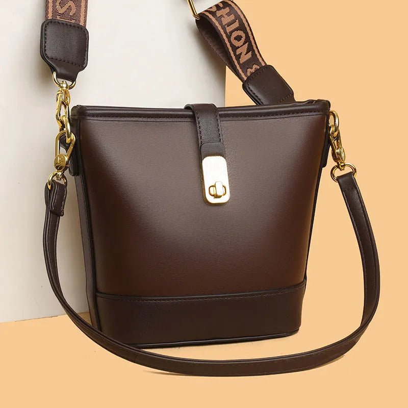 Korean style black bucket bag with multiple compartments and double shoulder straps