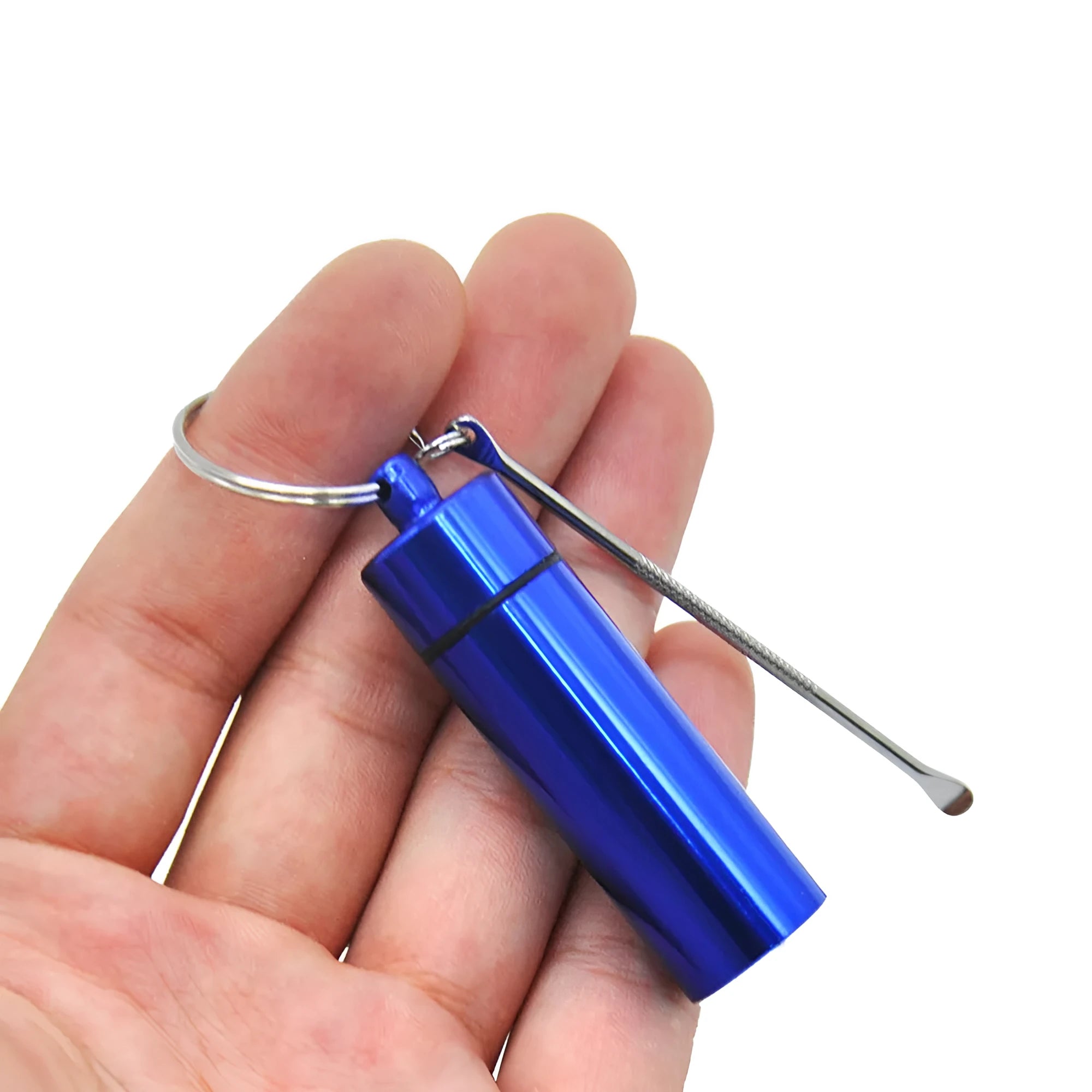 Small blue aluminium pill bottle with a silver spoon and keychain attached.