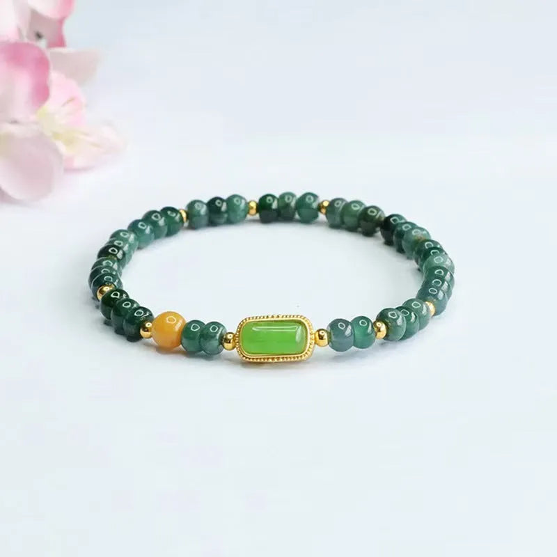 Blue natural stone bracelet with abacus beads in geometry shapes including round, oval and ring elements