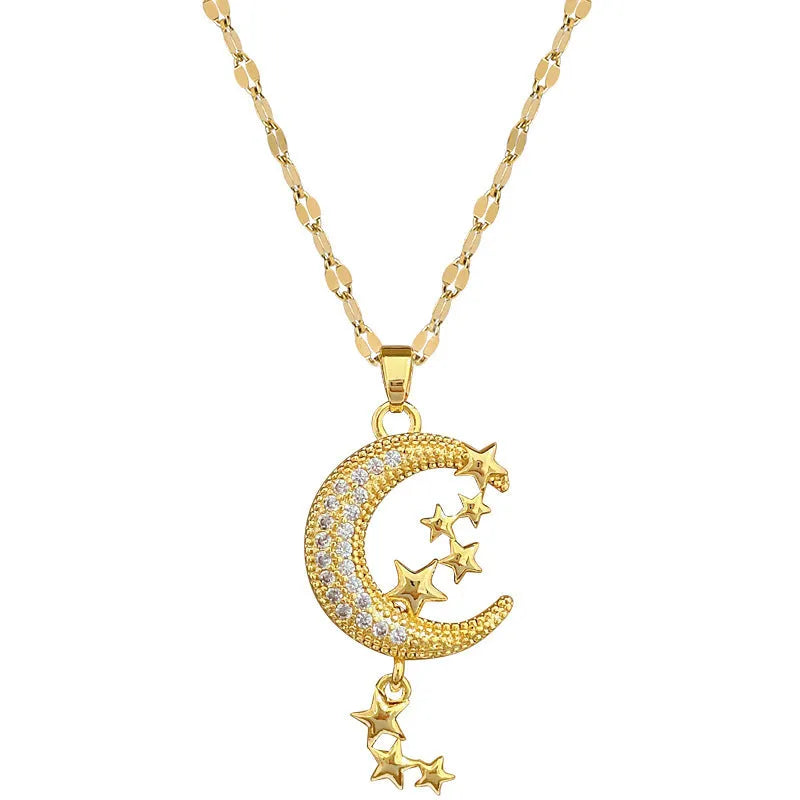 Moon tassel necklace with full diamond geometric pendant on a stainless steel chain, showing tassel detail.