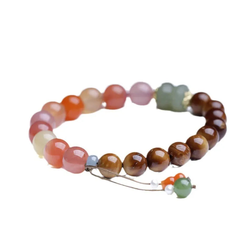 Handmade 8mm agate bracelet with diamond-shaped beads in natural persimmon colour tones