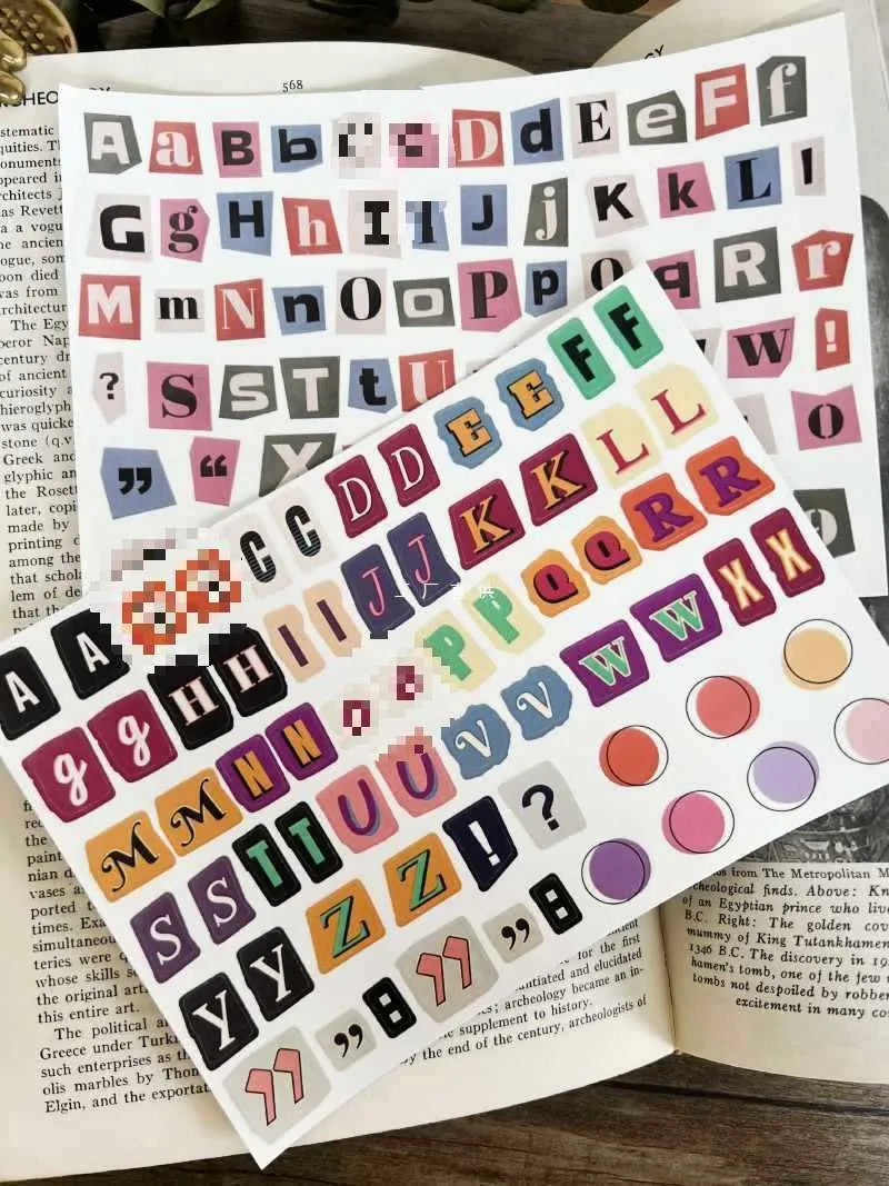 Pack of decorative stickers showing printed English alphabet letters and weekday words in a cute style for crafts.