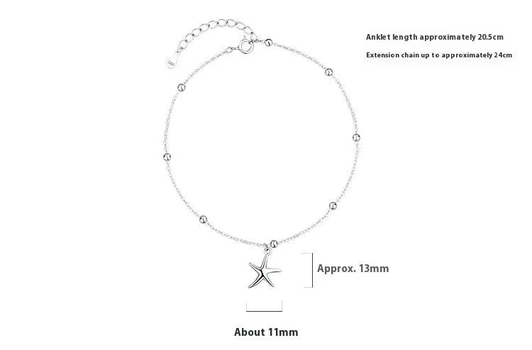 Adjustable sterling silver anklet with round beads and a detailed starfish charm on an ankle.