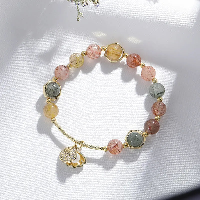Women's crystal bracelet with coloured hair crystal shells and animal zodiac designs