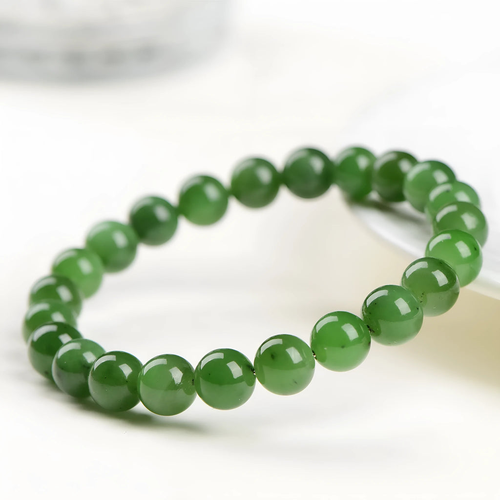 Natural Jasper ball bracelet on Hetian jade strand, showing polished beads in one of five available sizes.
