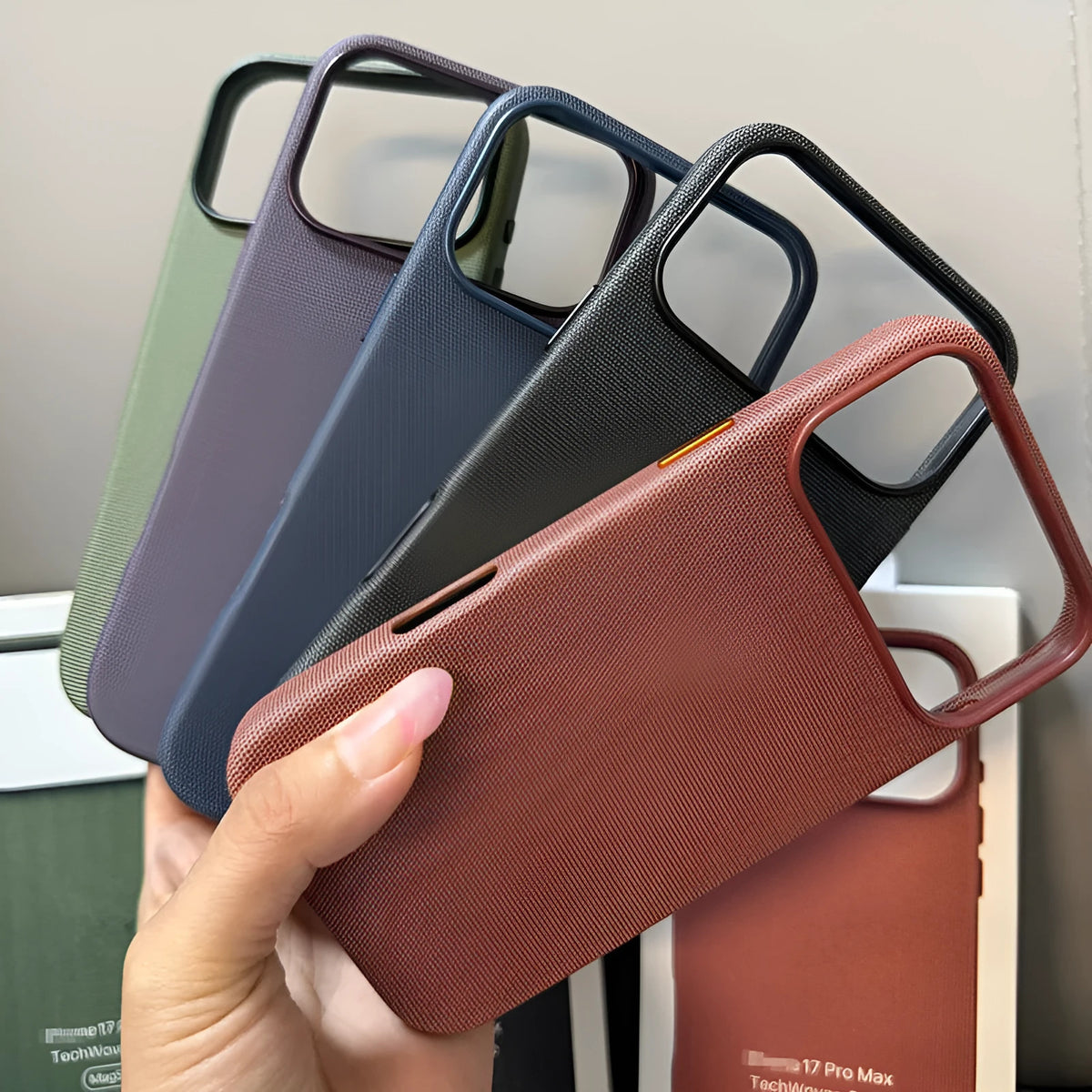 Woven cloth pattern phone case with magnetic suction and animation protective sleeve for iPhone 17 series in black, blue, brown, green or purple