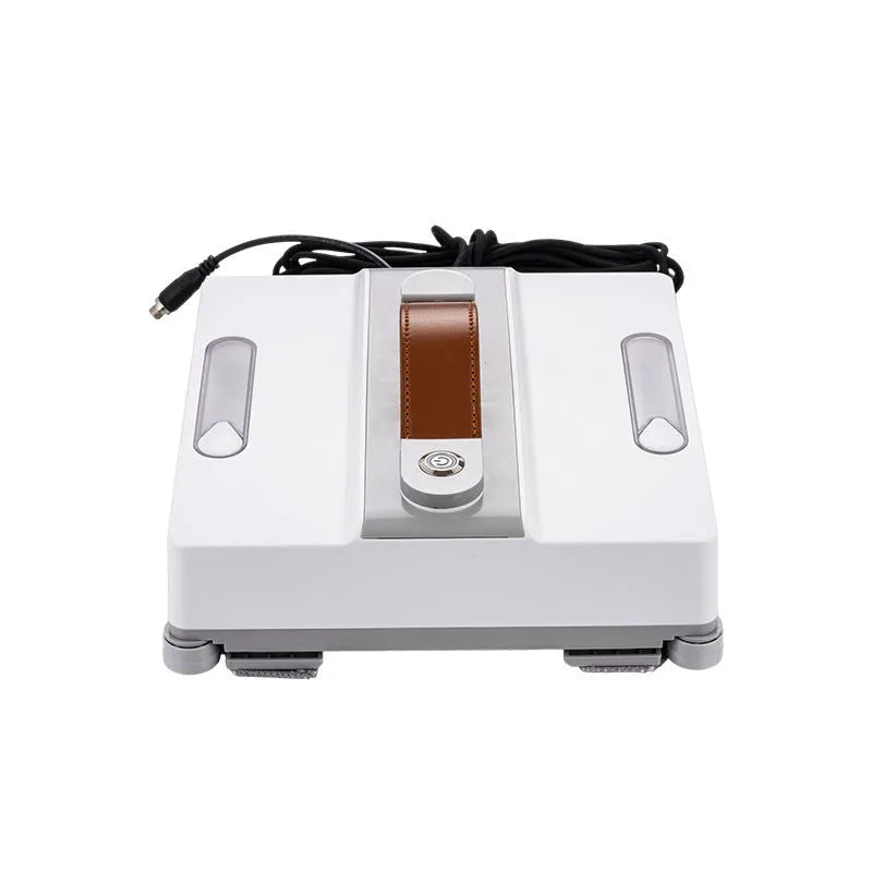 White intelligent window cleaning robot for high-rise buildings on a window pane.