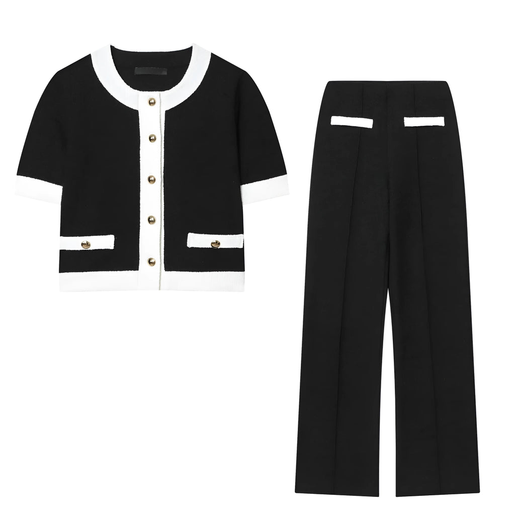 Women's casual suit set with a beaded leather top and high-waisted trousers on a model.