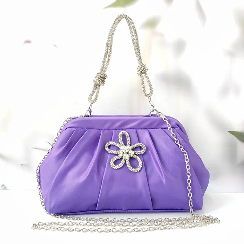 Women's soft polyester large-capacity shoulder messenger bag in shell shape with chain strap.