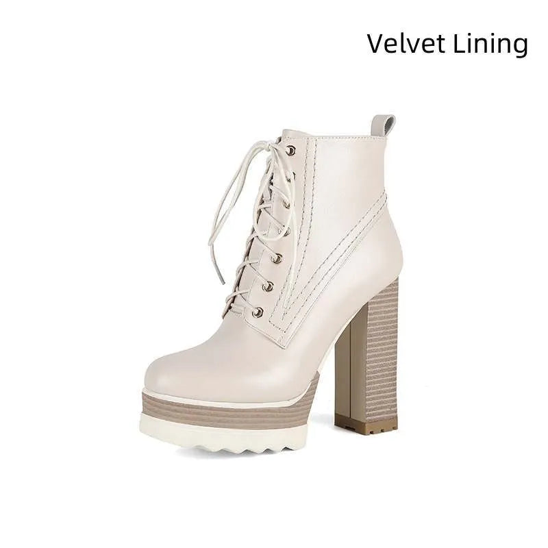Women's black chunky heel waterproof platform boots with a side zipper on a cowhide upper.
