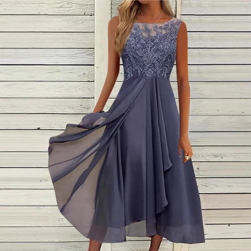 Women's sleeveless lace and chiffon dress in a princess style, shown in green colour.