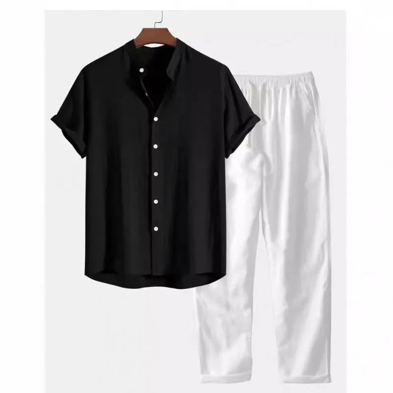 Man wearing a loose fit linen-look short sleeve shirt and matching casual trousers in a neutral colour.