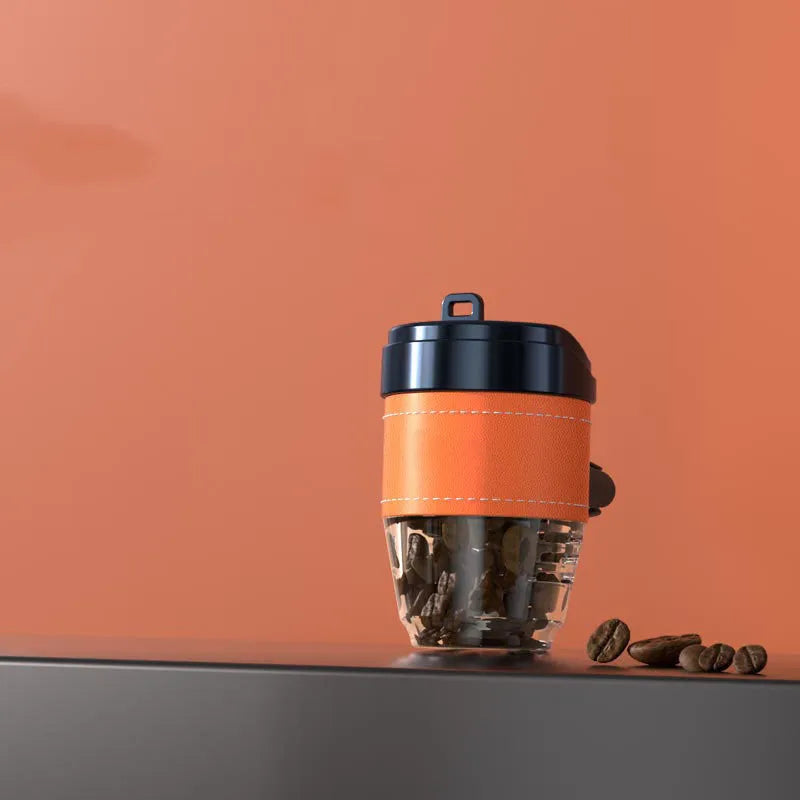 Coffee cup shaped solid car air freshener in black, brown, white, orange, or green.