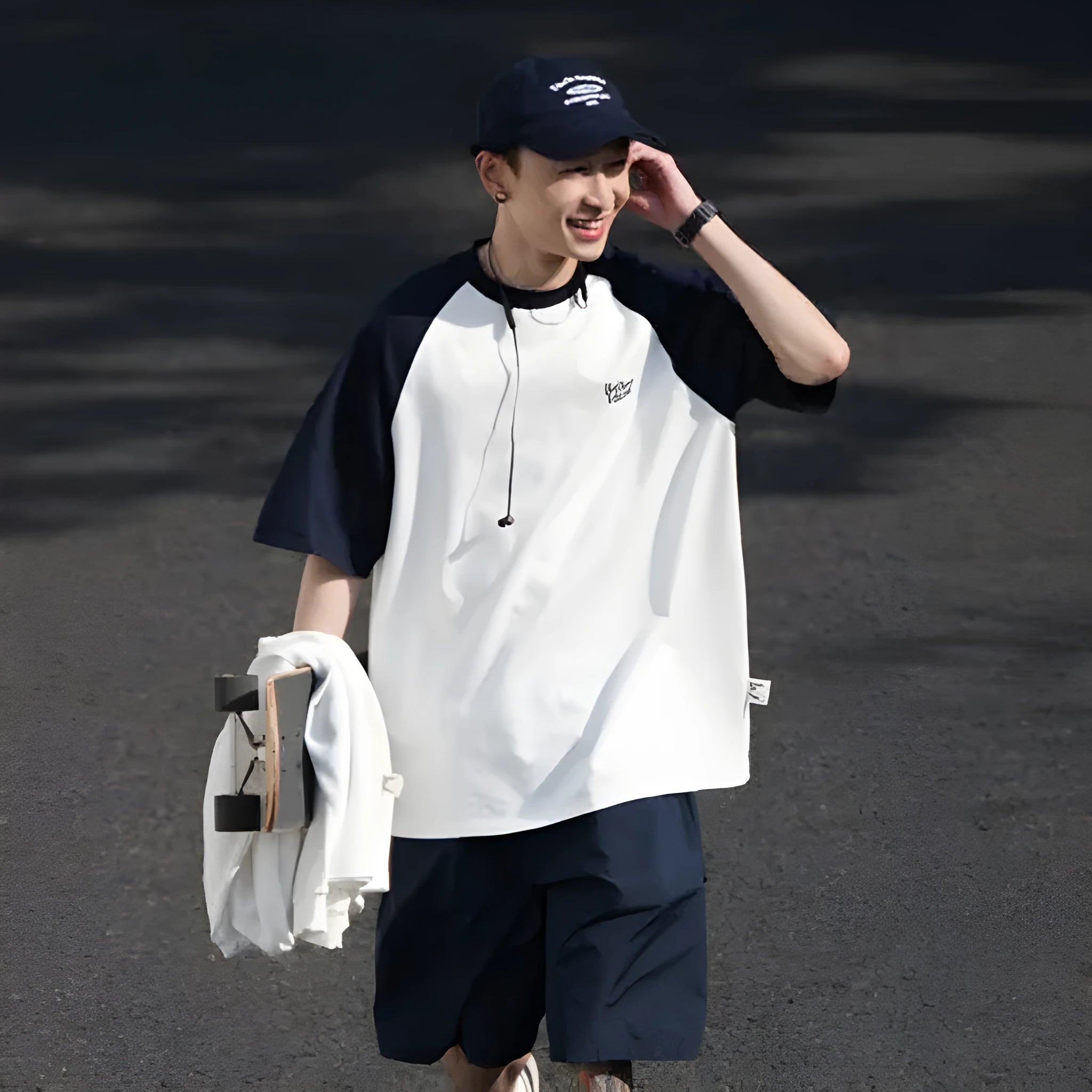 Blue loose-fit men's casual raglan sleeve T-shirt on a hanger
